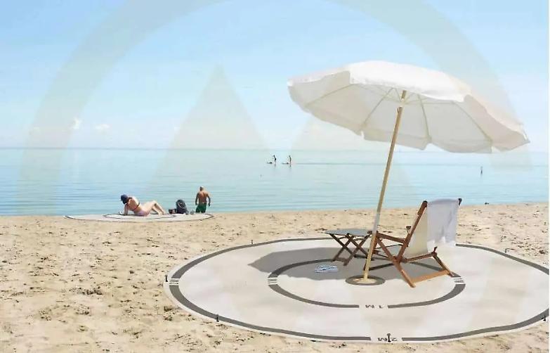 Quest&rsquo;estate sulla spiaggia con pinne, fucile, mascherina e amuchina